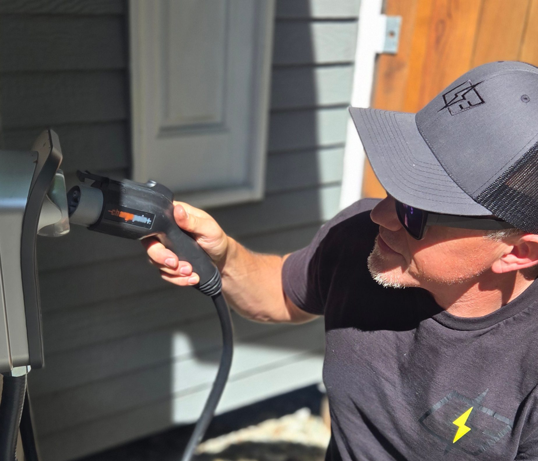 LABAW Electric technician working on home EV charging equipment